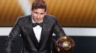 ZURICH, SWITZERLAND - JANUARY 07: Lionel Messi of Argentina receives the FIFA Ballon d'Or 2012 trophy on January 7, 2013 in Zurich, Switzerland. (Photo by Christof Koepsel/Getty Images)