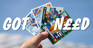 A hand holding four fanned out football cards with the words 'GOT, GOT, NEED' over the top