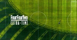 2D aerial shot of a football pitch with a grounds person cutting the grass